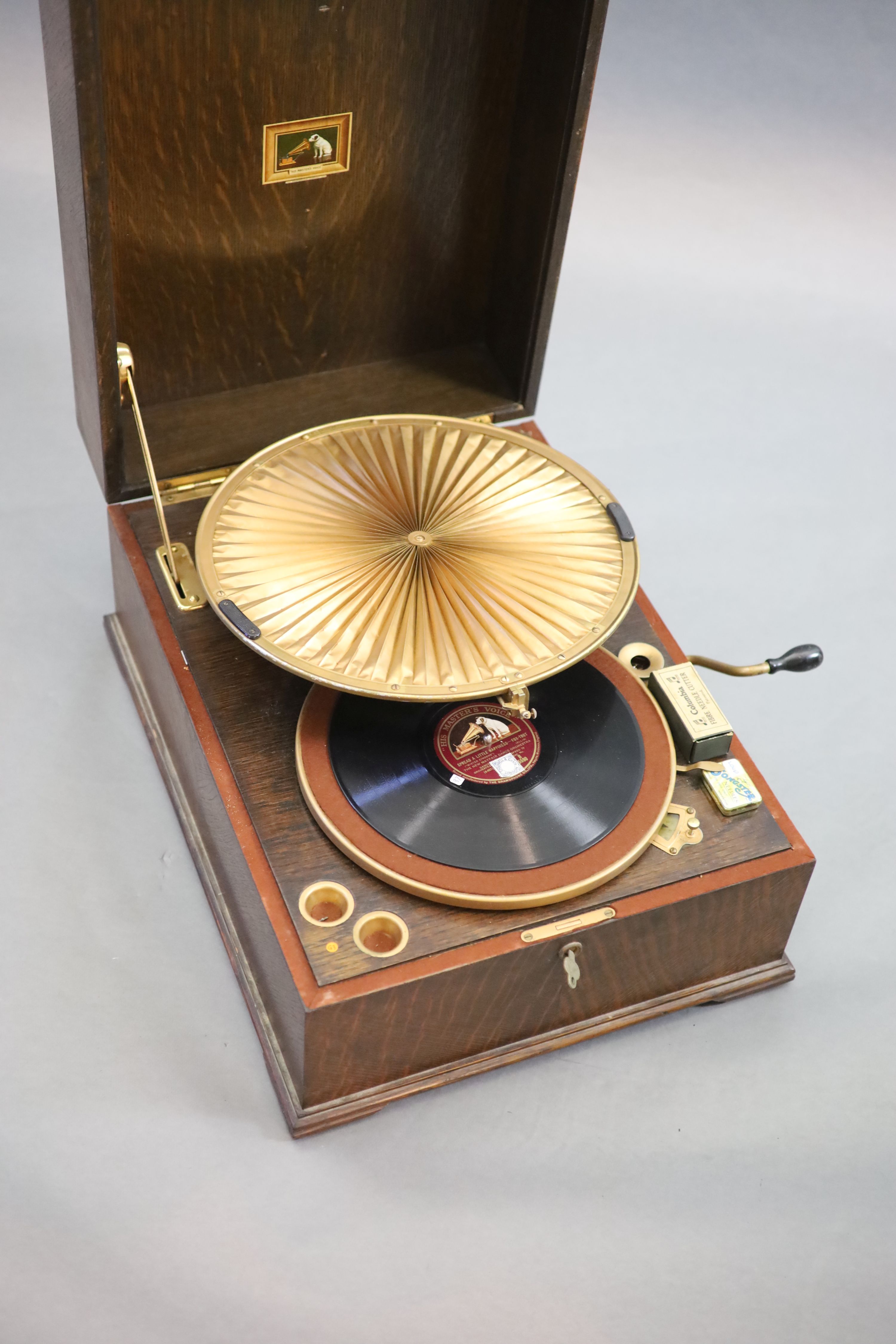 A HMV Lumiere model oak cased 460 gramophone, c1925, closed measurements 42cm wide, 55cm deep, 27cm high.